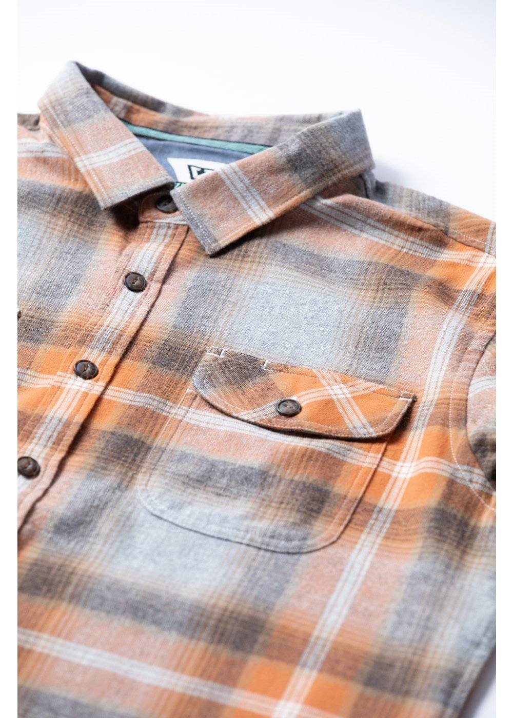 Vissla Central Coast Eco flannel shirt in brushed cotton, with orange, gray and white plaid, buttons and chest pocket