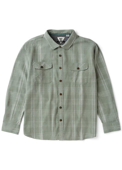Vissla Central Coast Eco flannel shirt in muted sage green cotton plaid, with long sleeves, button front and dual chest pockets.