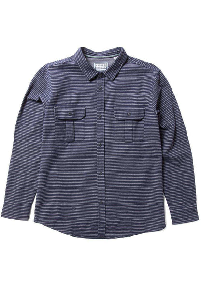 Vissla Creators Innovators flannel shirt in dark navy with fine horizontal stripes, long sleeves, and buttoned chest pockets.