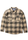 Vissla Creators Innovators flannel shirt in beige and charcoal organic cotton, with a bold plaid pattern and buttoned chest pockets.
