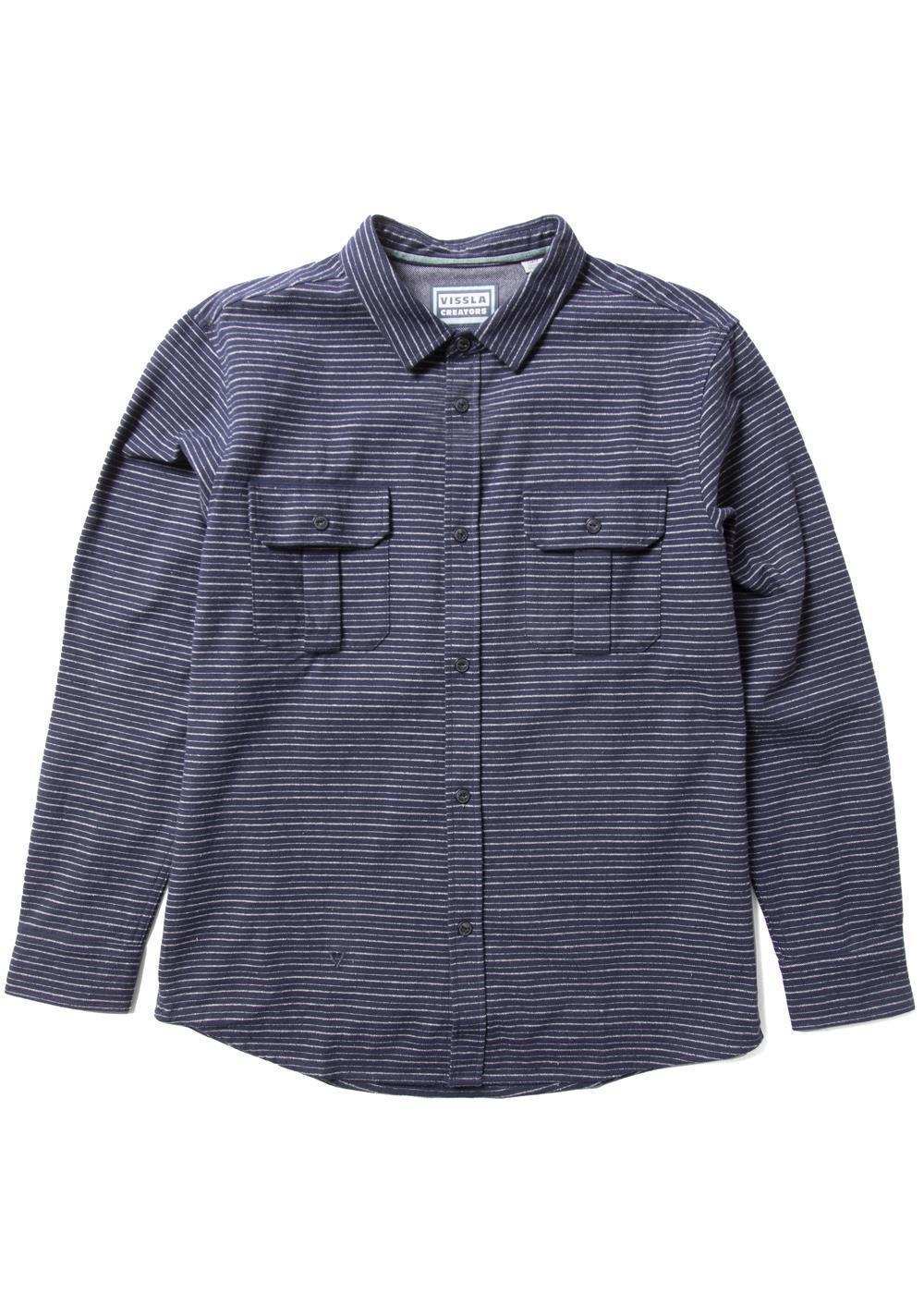 Vissla Creators Innovators flannel shirt in navy with fine white horizontal stripes, long sleeves and buttoned chest pockets.