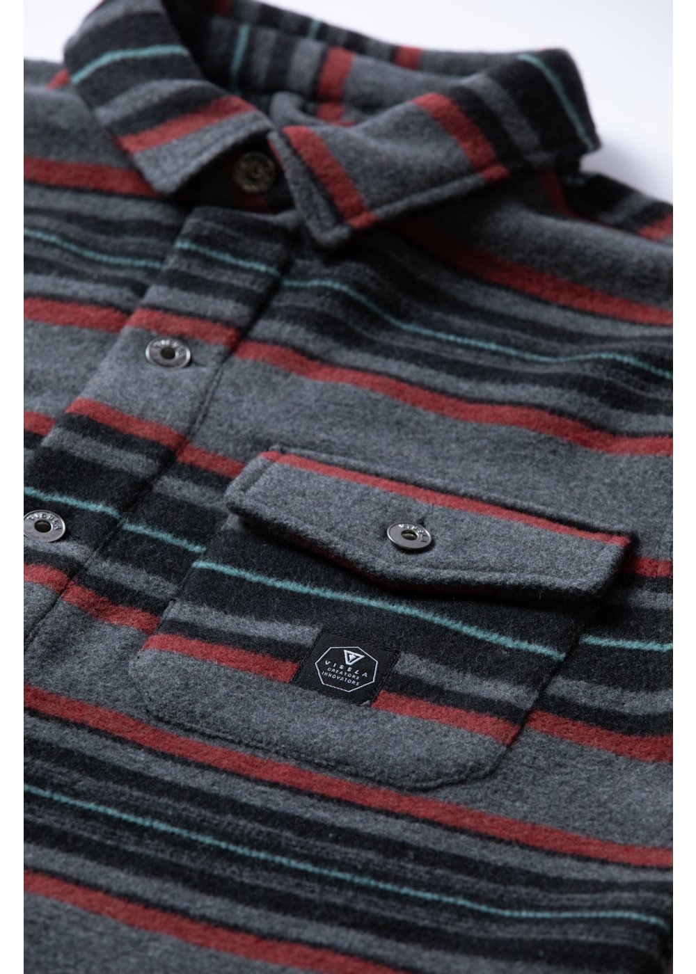 Vissla West Coast Overshirt in grey wool-blend fabric, with charcoal, red and teal stripes, button closure and chest pocket.