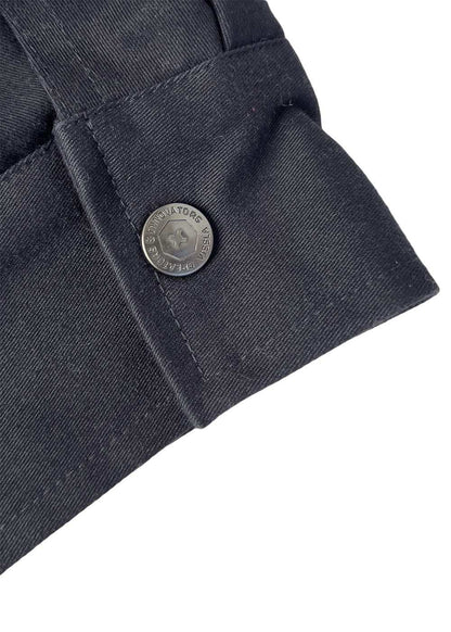 Vissla Creators Eco Port Jacket in charcoal cotton-blend twill, with a stitched cuff tab and branded metal snap button.