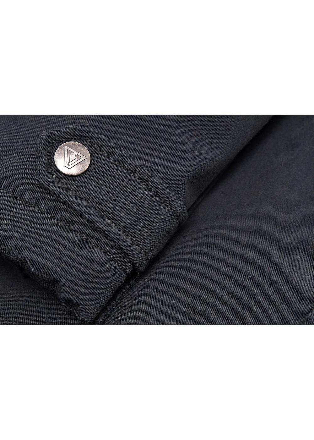 Vissla Tennessee III Parka in dark charcoal fabric, featuring a stitched cuff strap with a round metal logo button.