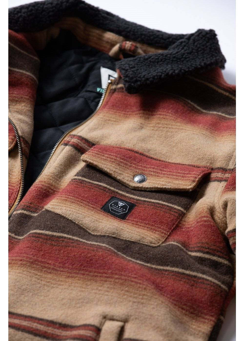 Vissla Buffalo Jacket in tan wool-blend fabric with red and brown stripes, black sherpa collar, zip front and chest pocket.