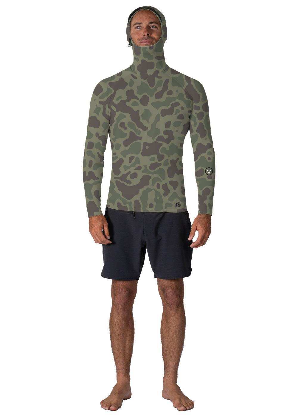 Hooded rash guard, Vissla Warm Seas, in olive green and brown camouflage stretch fabric with long sleeves and a close fit.