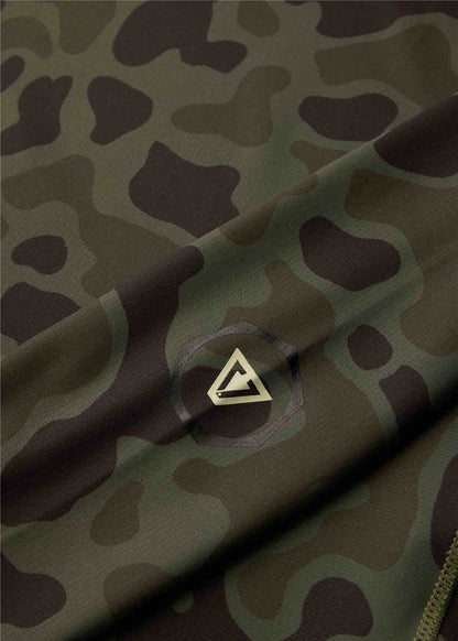 Vissla Warm Seas hooded lycra in olive and black camouflage print, with a small geometric chest logo.