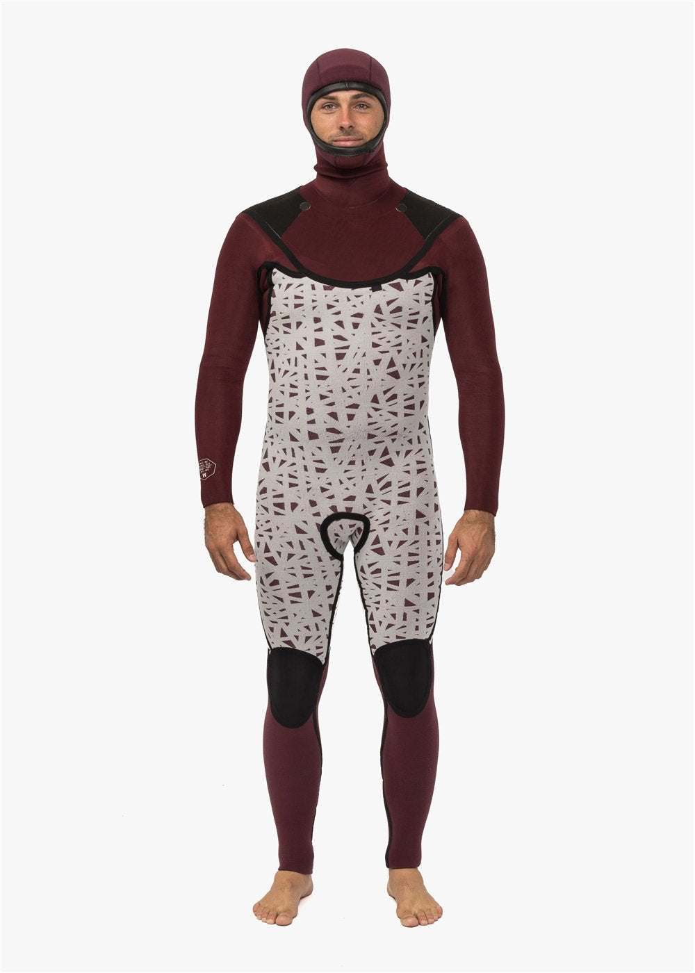 Full-body hooded wetsuit in burgundy and light grey with black abstract pattern and reinforced knee pads, featuring a slim fit and Vissla New Seas design.