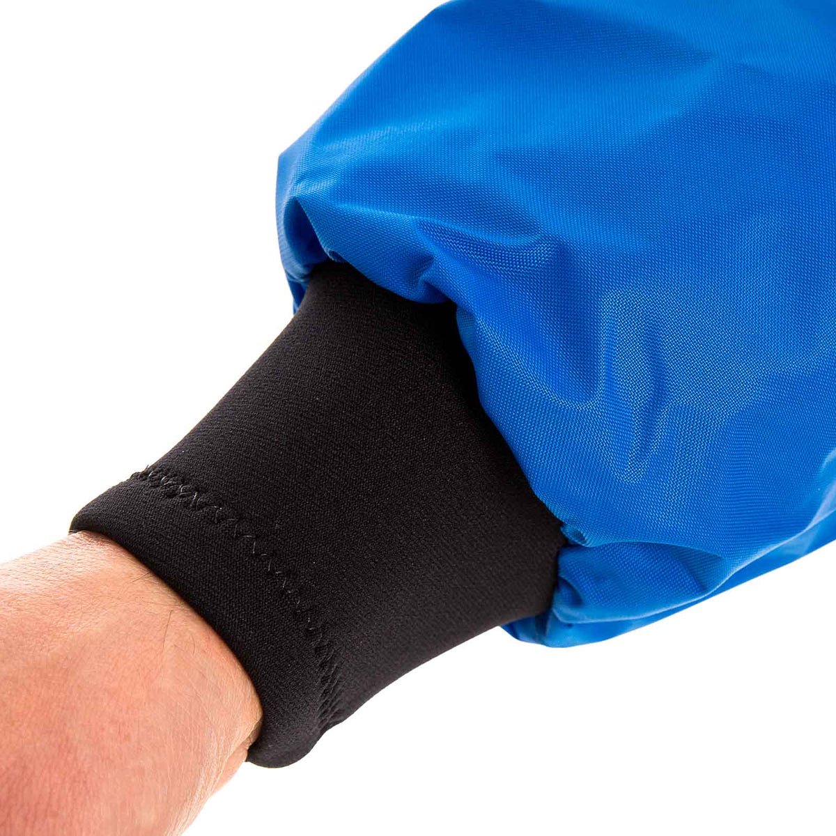 Spray Jacket sleeve with a bright blue nylon shell and black neoprene cuff, showing the snug stitched wrist seal.
