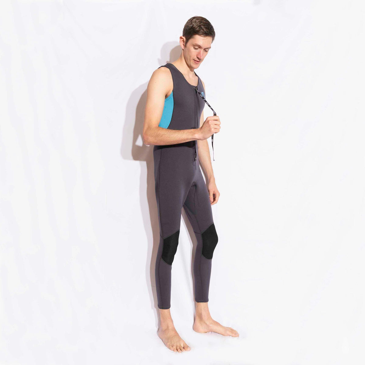 Mens 3/2mm LONG JOHN wetsuit in dark grey neoprene with blue side panels, black knee pads and a front zip.