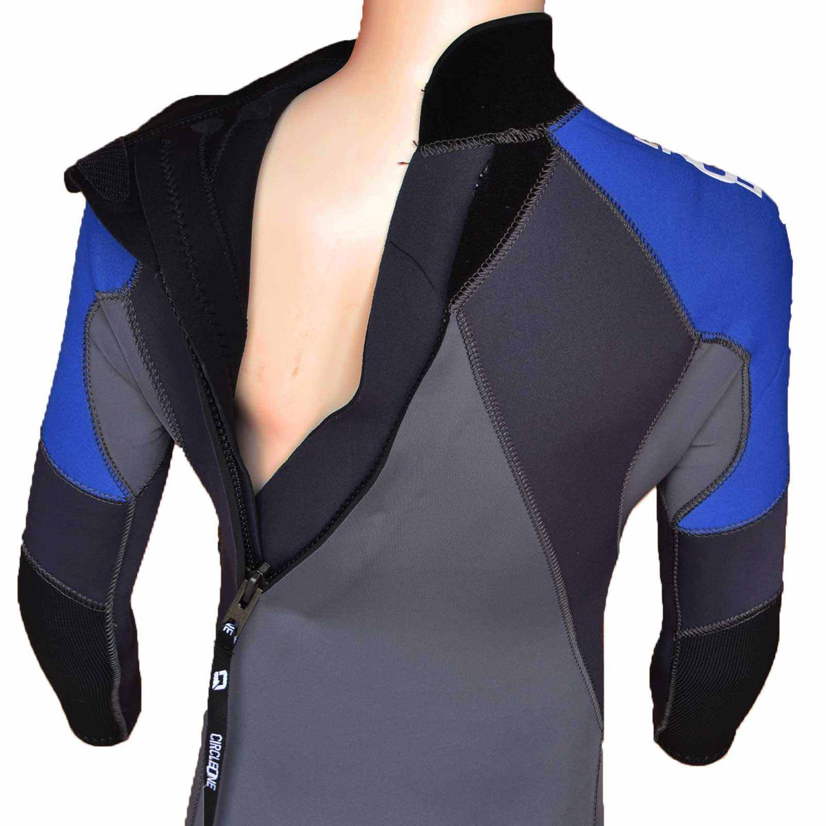 ARC 5/4mm KIDS back-zip wetsuit in black, charcoal grey and blue neoprene, with reinforced panels and a diagonal zip.
