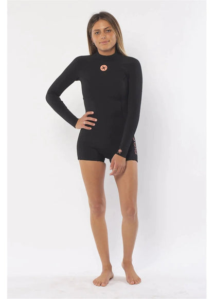 Sisstr Summer Seas spring suit in solid black neoprene, with long sleeves, a high neck, and boy-short legs.