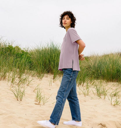 Woman wearing vibrant organic cotton graphic tee from Kooks on the Road collection