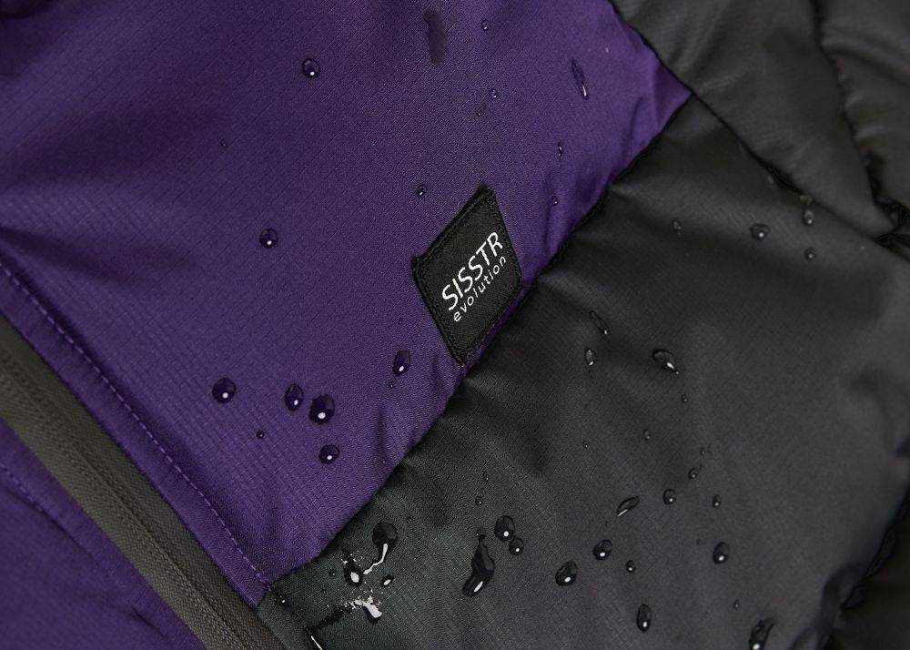 Sisstrevolution Rita Puff Jacket in purple and black, with smooth water-resistant fabric, quilted puff panels, and logo label.