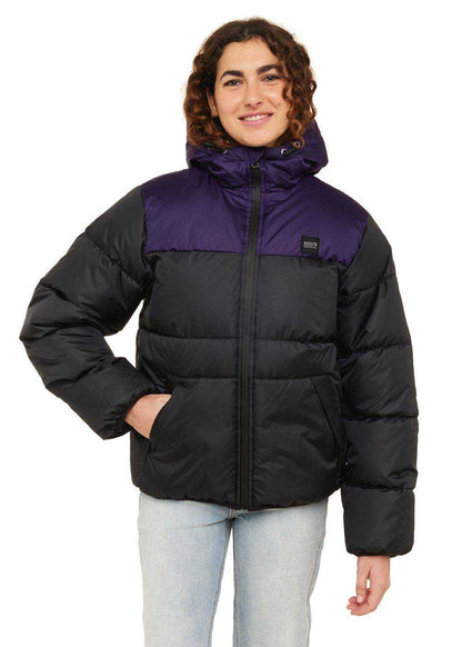 Sisstrevolution Rita Puff Jacket with black and deep purple color-block panels, quilted puffer construction, hood, and zip front.