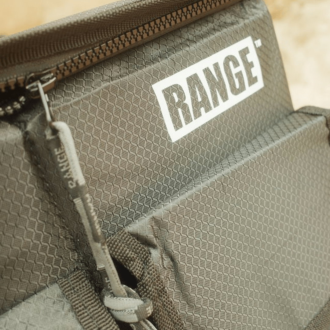 Range Lethal Organizator, olive drab textured fabric with a zip closure, mesh pocket and bold white Range logo.