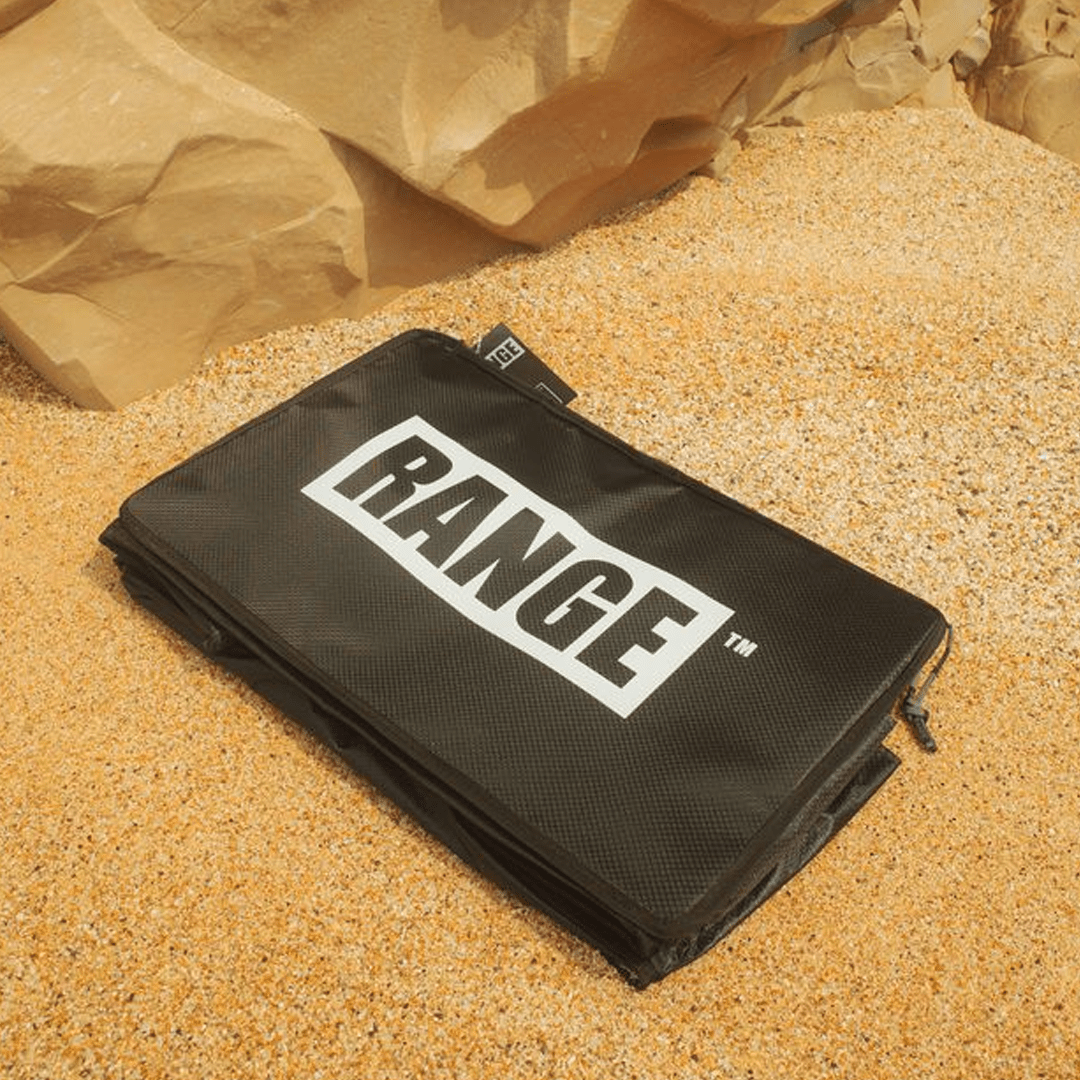 Range Lethal Organizator black rectangular zippered gear bag, textured fabric with large white RANGE lettering and a side zipper pull.