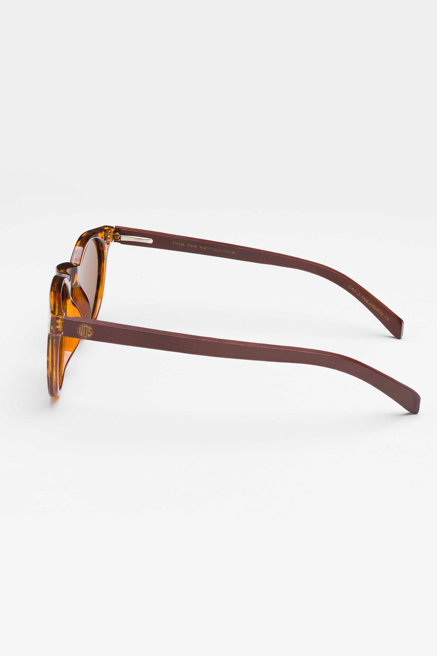 Mini Malibu tortoiseshell sunglasses with pink camo frame, wooden arms, and rose gold polarized lenses