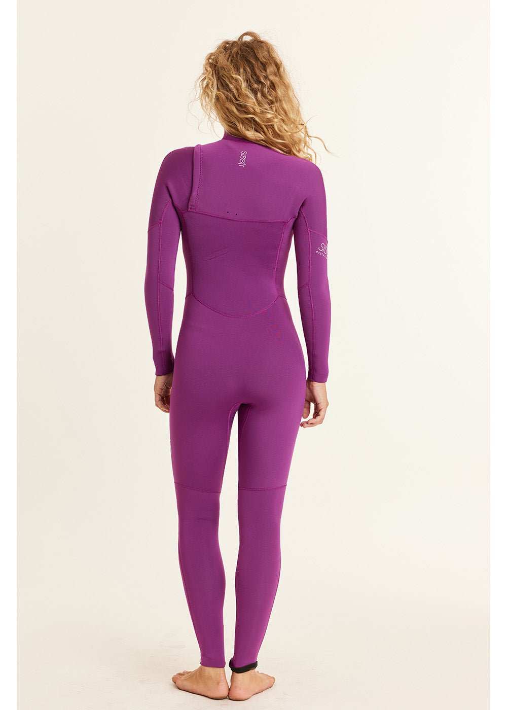 Sisstr 7 Seas 5/4 Chest Zip Wetsuit in vibrant magenta stretch neoprene, with long sleeves and full-length legs.