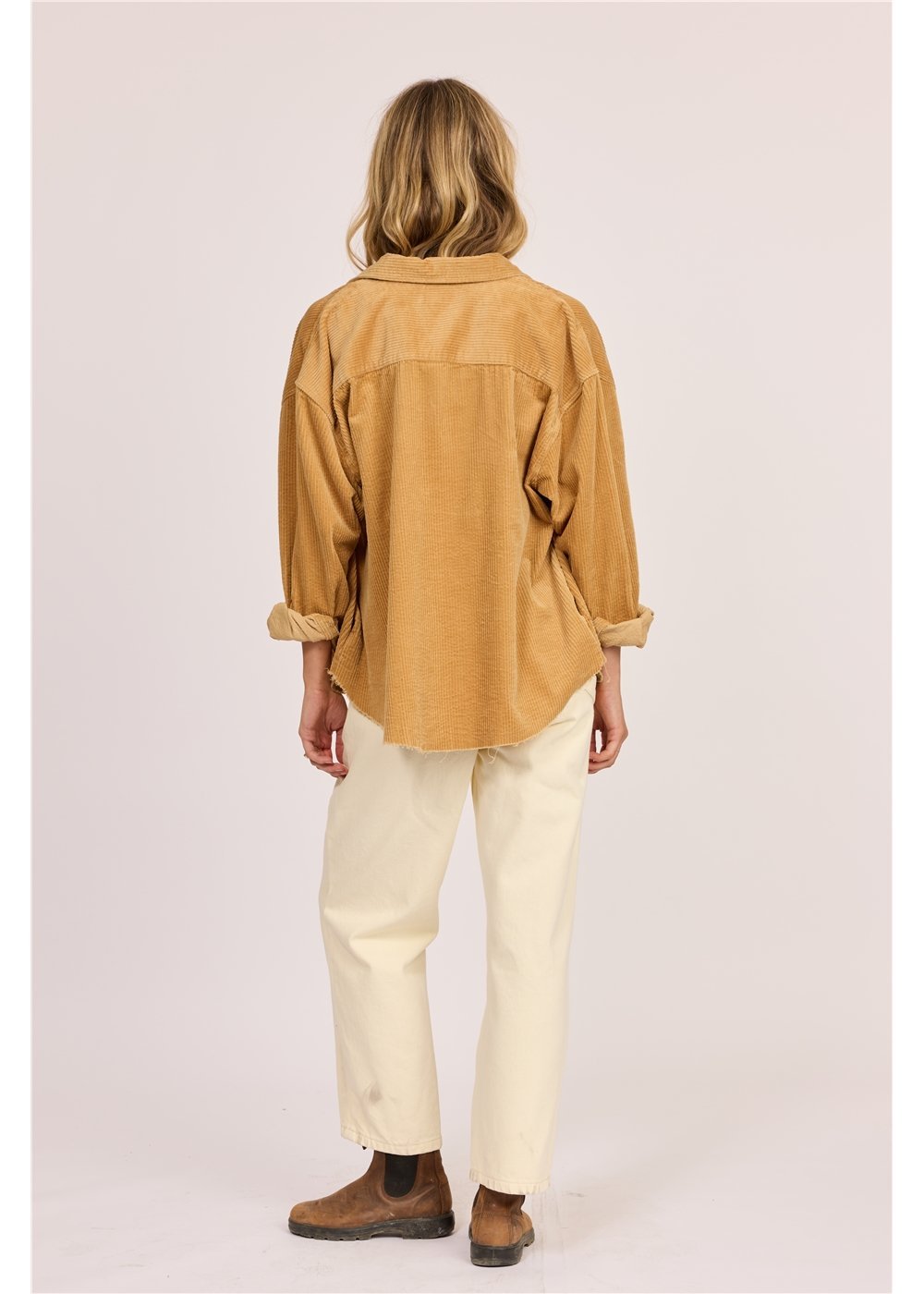 Sisstr After Hours corduroy shacket in golden tan cotton, with a collared neckline, button front, and rolled cuffs.