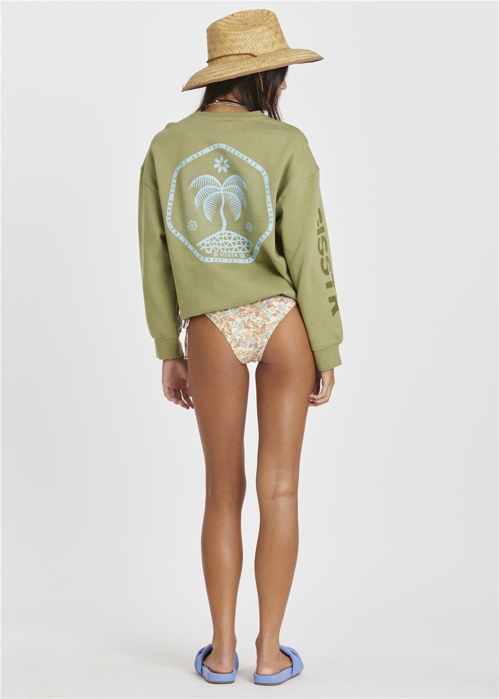 Sisstr Day Trip crewneck fleece in olive green cotton blend with pale blue back graphic and sleeve lettering.
