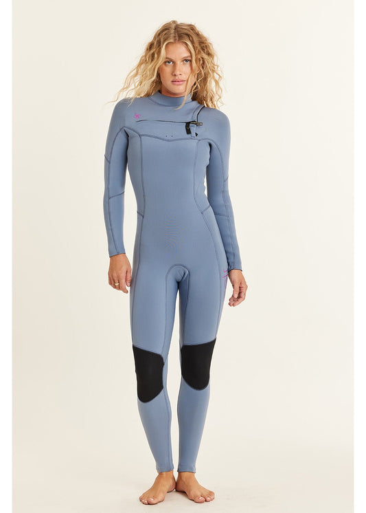 Women’s Sisstr 7 seas 4/3 wetsuit in slate blue neoprene, with a high neck, chest zip and black knee panels.