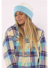 Sisstrevolution August Knit beanie in two-tone white and light blue knit, with a wide folded cuff.