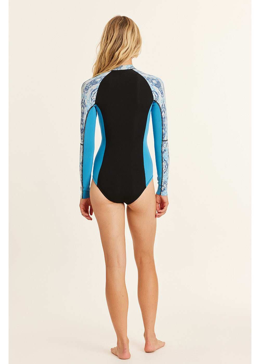 Summer Seas Cheeky Wetsuit featuring long sleeves with blue and white floral pattern, black and blue neoprene body, cheeky bottom fit